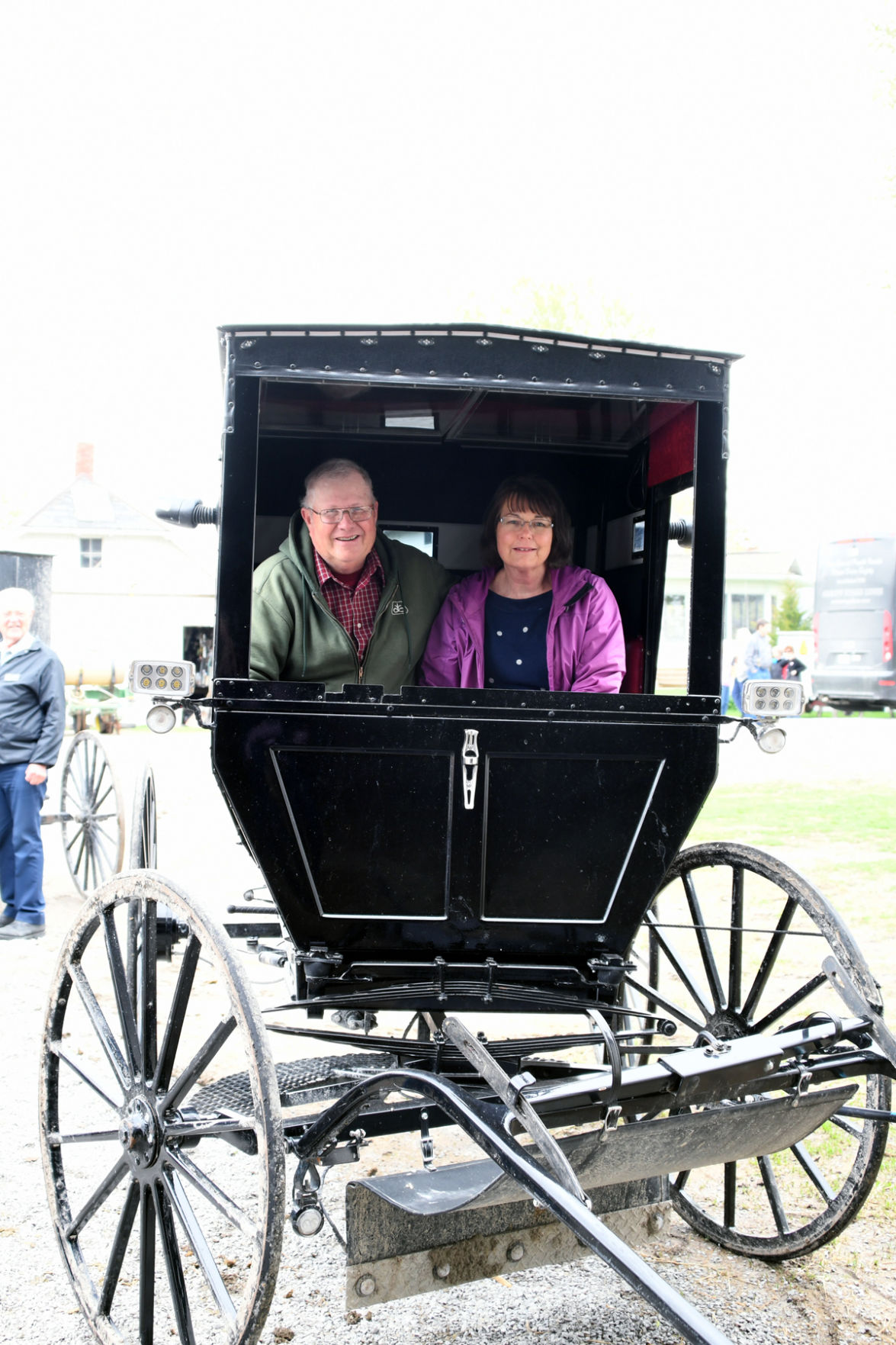 125 Curt and Mary Folkerts in an Amish buggy.JPG
